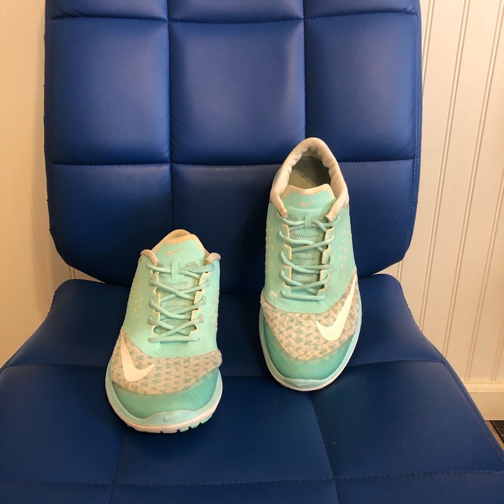 Women’s teal running Nikes